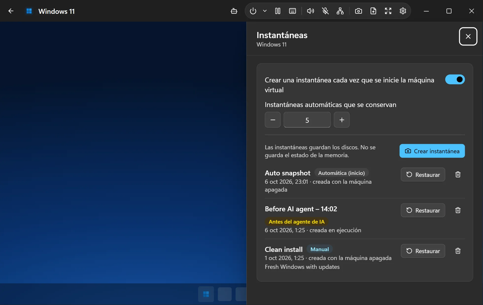 El panel Instantáneas de una VM con Windows 11: una instantánea automática al arrancar, otra creada antes de que actuara un agente de IA y una manual, cada una con su botón Restaurar.